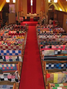 Quilts are blessed before sending them out for comfort to others.